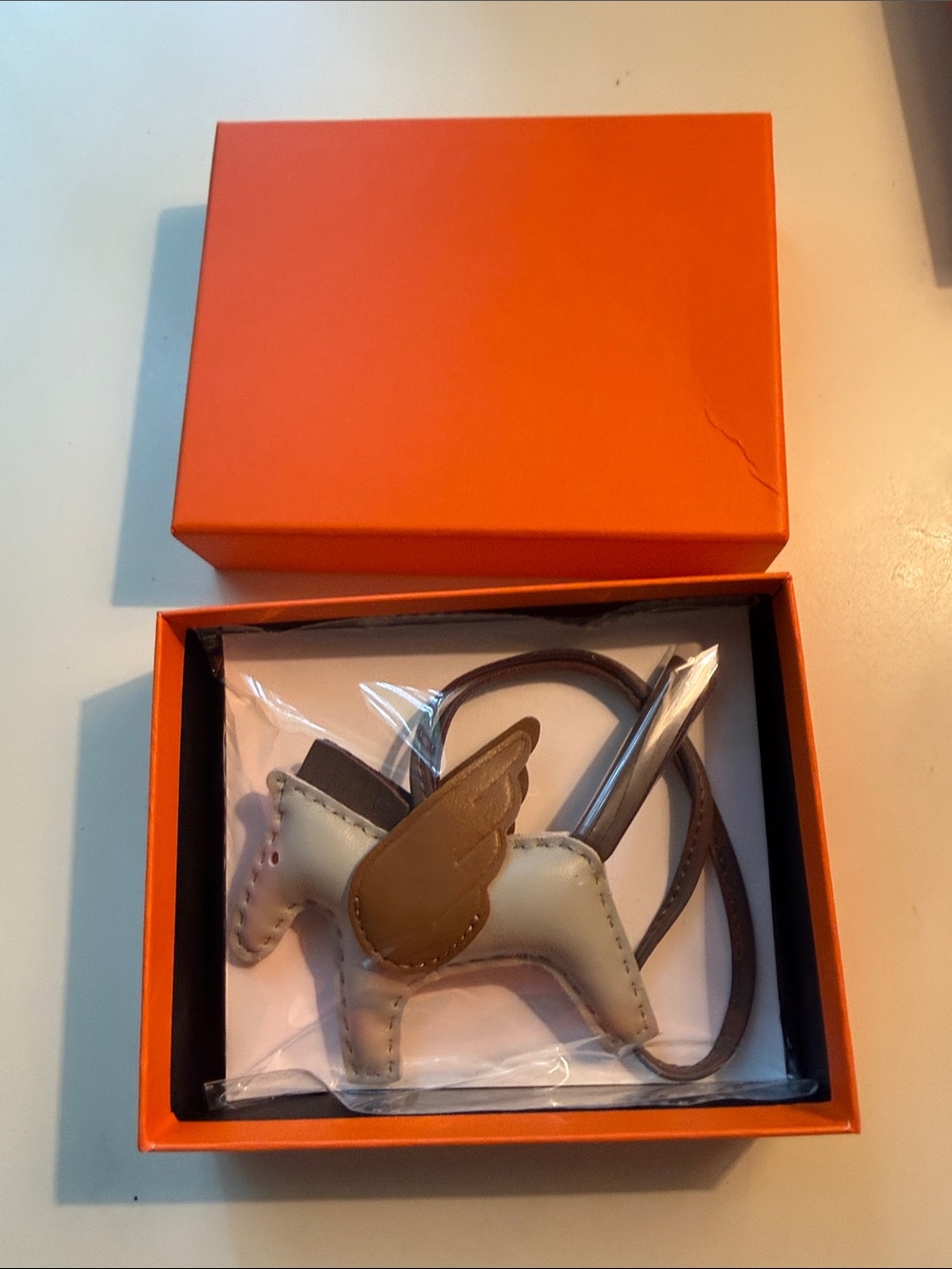 Hermes Two-Tone Leather Winged Horse Charm - Cream and Brown